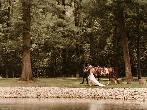 Bride and Groom with horse