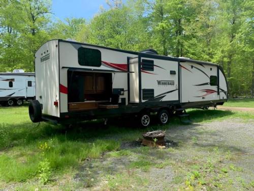 Parked trailer at site Sterling/Lake Ontario KOA Holiday