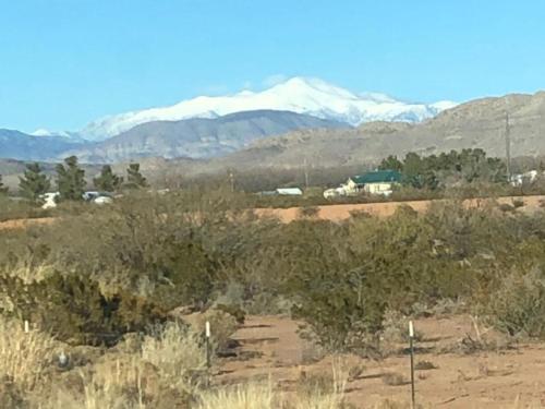 A view of the mountain with snow at MOUNTAIN MEADOWS RV PARK