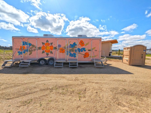 Trailer painted with flowers at Vinyl Vineyards