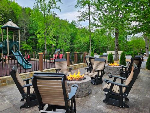 Chairs around fire pit at DUDLEY CREEK RV RESORT