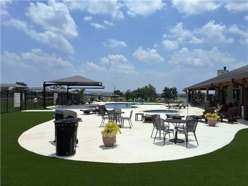Community patio with barbeque and seating