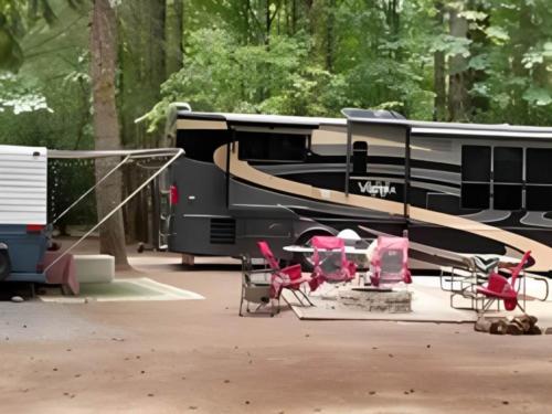 Parked RV at site Cougar RV Park & Campground