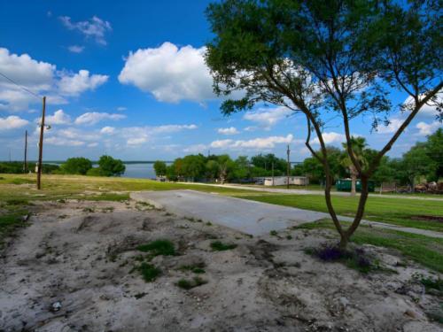 Open paved RV space at site Lake Corpus Christi RV Resort