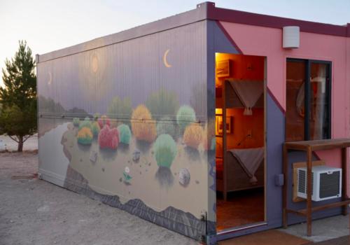 Cabin with inside look at site Hostel Cubed at Joshua Tree Lake