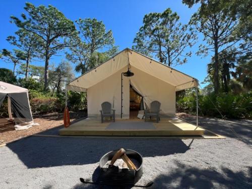 Patio in front of glamping tent at Timberline Glamping at Sarasota