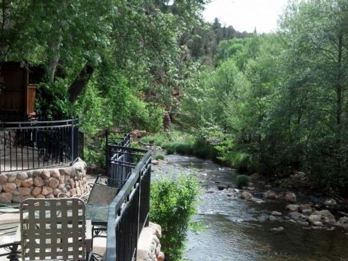 Deck overlooking the creek at OAK CREEK MOBILODGE