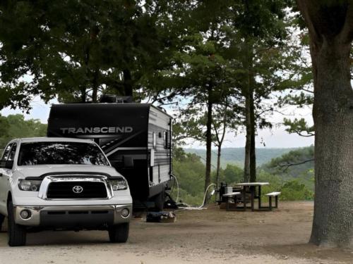 Parked trailer at site Route 62 Motor Resort