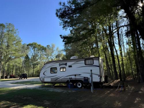 Parked trailer at site Songbird RV Park