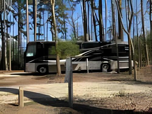 A class A motorhome at site at Songbird RV Park 2
