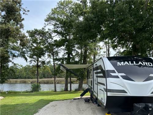 A travel trailer parked at a site