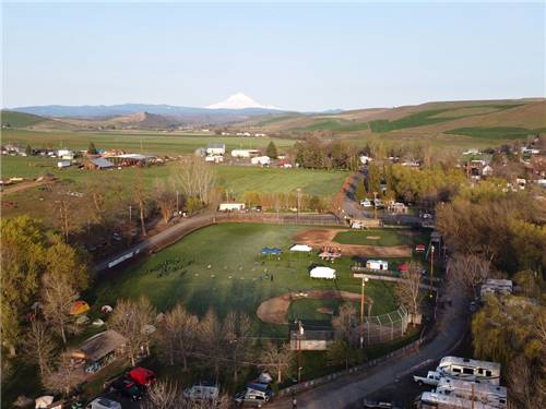 Aerial view of campground with mountain in the background