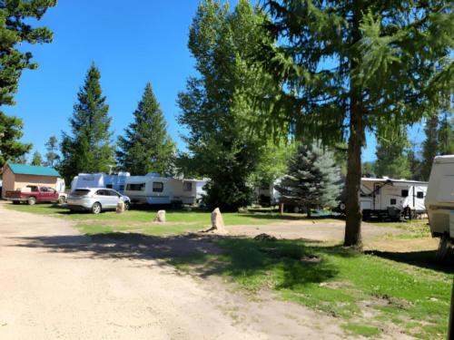 Parked trailers at site Clear Creek Station RV Park