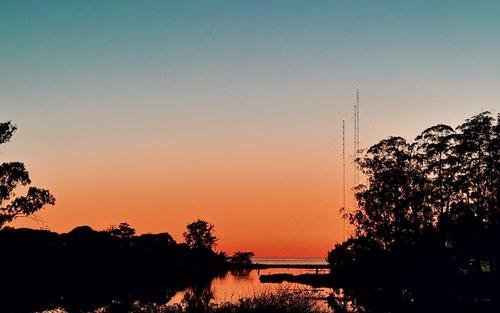 RV parked near open site at Beach RV Pleasure Point