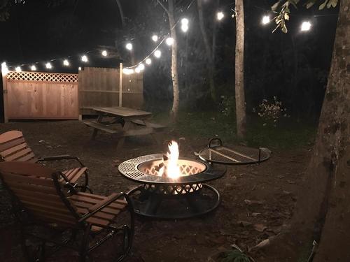 Firepit surrounded by chairs