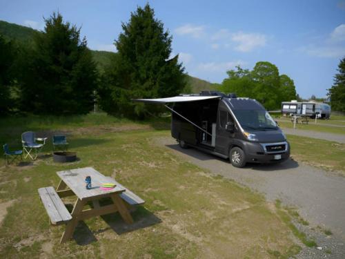 Parked RV at site Greek Peak Campground at Hope Lake