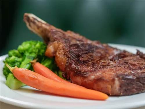 A steak and vegetables