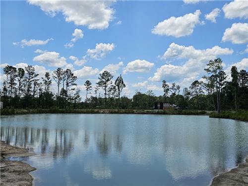 Blue sky and clouds reflecting on the pond