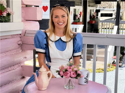 A woman dressed as Alice