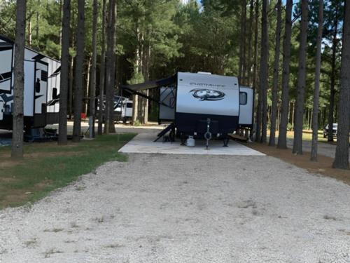 Parked RV at American Robin RV Park & Bird Sanctuary