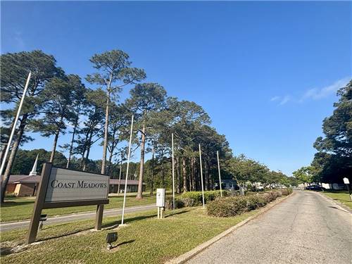 Paved road leading to park