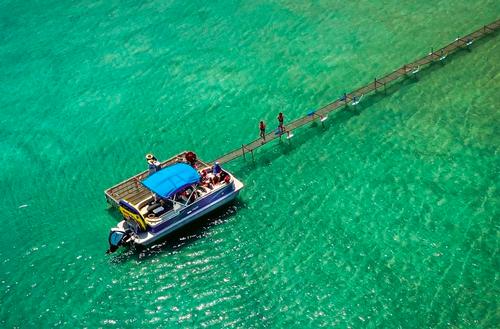 Boat parked near dock at Sun Outdoors Garden City Utah