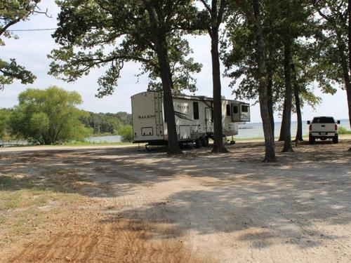 Parked trailer at site Anchor Inn Marina and Resort