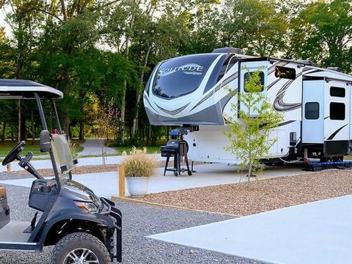 Parked trailer at site Beaverfork Lake RV Resort