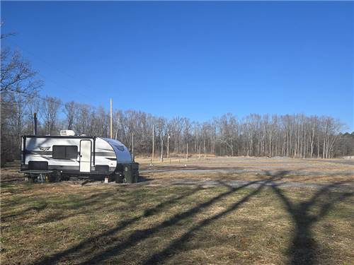 A travel trailer parked at a site