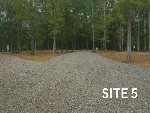 Gravel site 5 at Huckleberry Hideaway Cabins & RV Resort