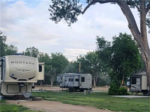 Travel trailers parked in RV spaces