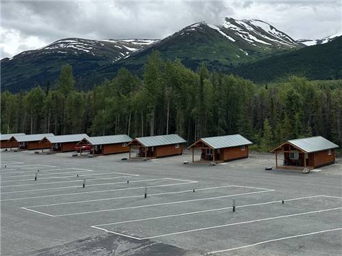 A row of rental cabins and RV sites