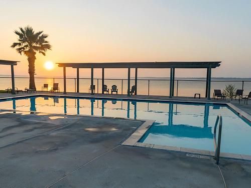 Swimming pull area at sunset