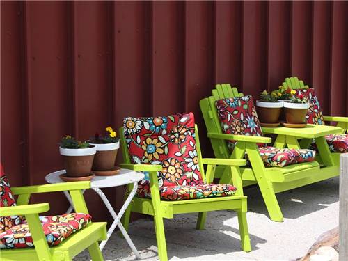 Green chairs with cushions