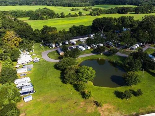 Aerial shot of pond and RV sites at Winners Circle RV Resort