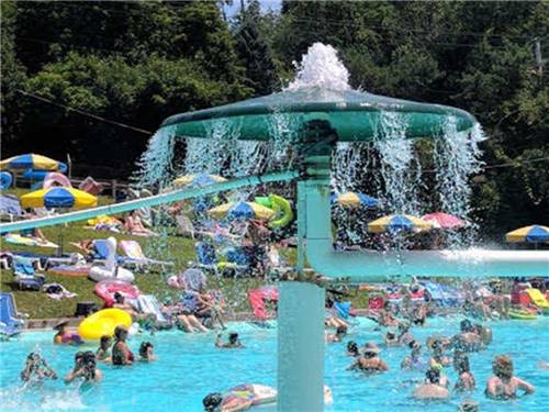 The splash zone in the swimming pool at PINE COVE BEACH CLUB & RV RESORT