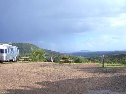 Gravel sites with picnic tables at RATON PASS CAMP & CAFE
