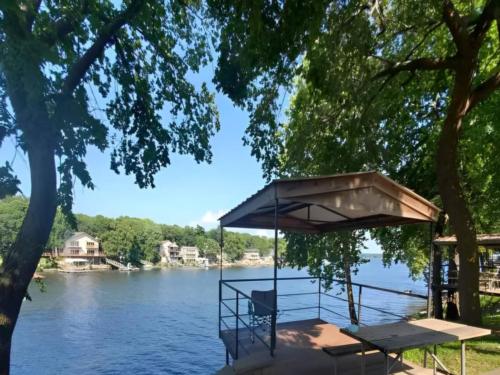 Deck over lake at Water's Edge RV & Cabin Resort