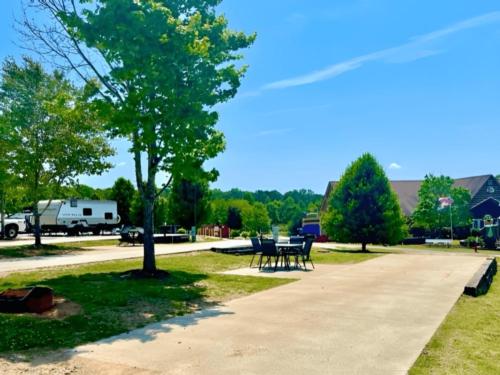 Open RV space with panic area at site Jellystone Park™ West Georgia