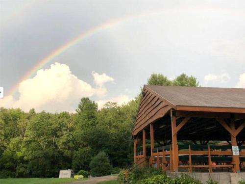 A rainbow view from the pavilion at WHITE PINES CAMPSITES