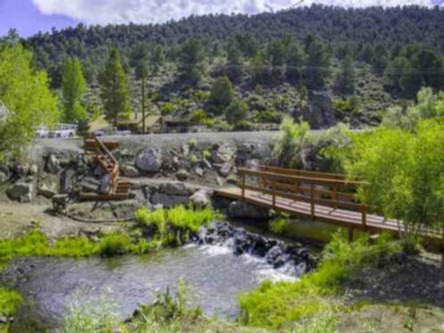 Wooden bridge over creek at Willow Springs Resort