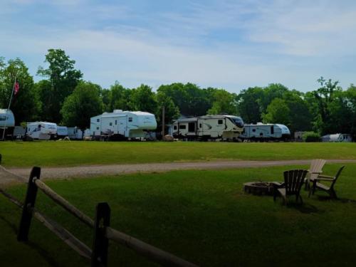 Parked trailers at site Nelson's Family Campground