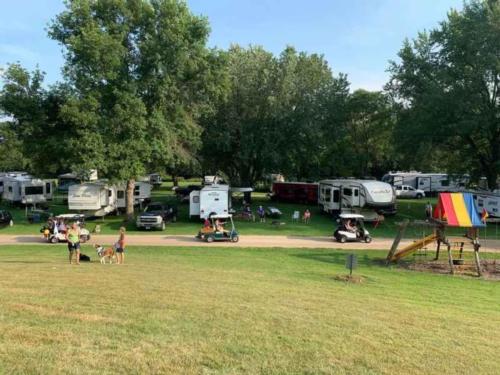 Sites and playground at Hidden Meadows RV Park