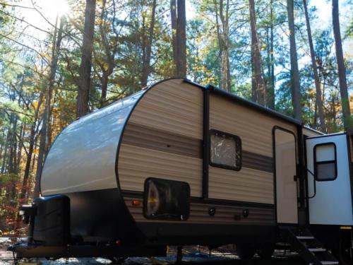 Parked trailer at site Big Mineral Resort, Marina and Campground
