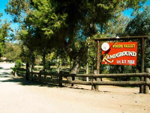 The front entrance sign at WOODS VALLEY KAMPGROUND & RV PARK