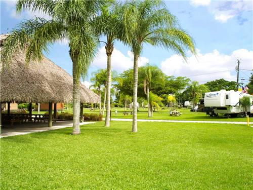 Patio area with picnic tables at ENCORE MIAMI EVERGLADES