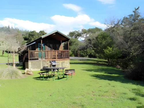 Cabin in front of panic table at Cloverdale/Healdsburg Campground