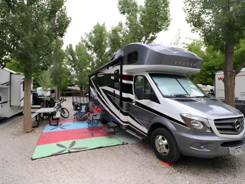 RV parked at site Sun Outdoors Moab Downtown