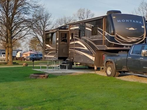 Parked trailer at site Yogi Bear's Jellystone Park Camp-Resort