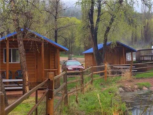 A couple of rustic rental cabins at LONE DUCK CAMPGROUND